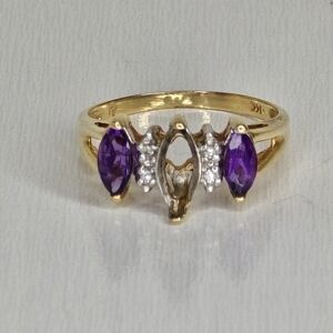 Elegant Gold and Purple Gemstone Ring